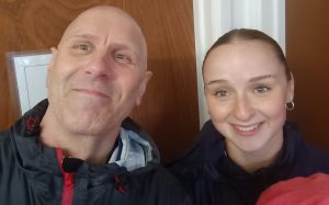 Two very damp but happy coaches: Taz and Erin.