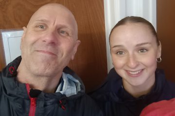 Two very damp but happy coaches: Taz and Erin.